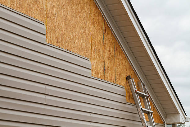 Professional Siding Installation technician working in Railroad, PA